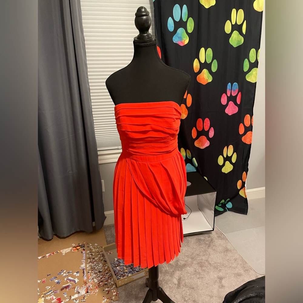 Strapless orange dress with pleated detail #partydress #specialoccasion